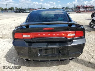 2014 Dodge Charger SE with VIN 2C3CDXBG4EH154769, listed as a Copart auction lot 51406345 with 253,019 mi miles and Clean Title. Bid and sale history available at carsss.com. Image 6.