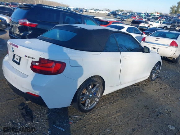 2015 BMW 2 Series M235i with VIN WBA1M1C5XFV393732, listed as a IAAI auction lot 41446007 with 187,781 mi miles. Bid and sale history available at carsss.com. Image 4.