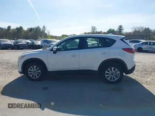 2015 Mazda CX-5 Sport with VIN JM3KE4BY3F0495511, listed as a IAAI auction lot 42170968 with 206,217 mi miles and . Bid and sale history available at carsss.com. Image 14.