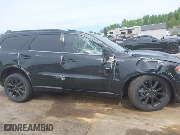 2018 Dodge Durango GT with VIN 1C4RDJDG0JC317561, listed as a IAAI auction lot 42110671 with 84,147 mi miles and . Bid and sale history available at DreamBid. Image 13.