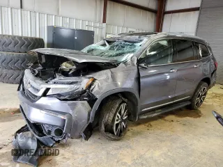 2019 Honda Pilot Touring 8-Passenger with VIN 5FNYF6H96KB082196, listed as a Copart auction lot 52851925 with 57,163 mi miles and Salvage title. Bid and sale history available at DreamBid. Image 1.