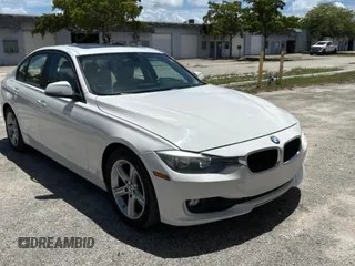 2013 BMW 3 Series 328i with VIN WBA3A5G52DNP19023, listed as a Copart auction lot 64805385 with 153,482 mi miles and Salvage title. Bid and sale history available at DreamBid. Image 1.