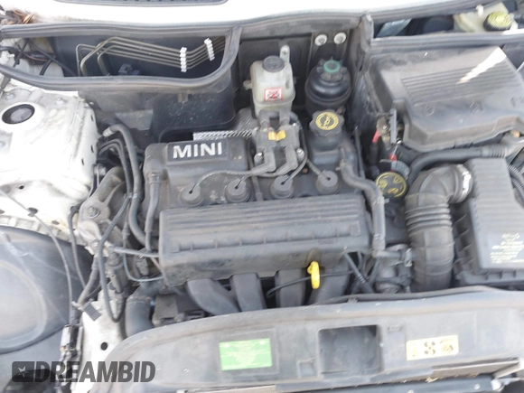 2006 MINI Hardtop with VIN WMWRC33596TK73174, listed as a IAAI auction lot 41848500 with 182,704 mi miles and . Bid and sale history available at DreamBid. Image 10.