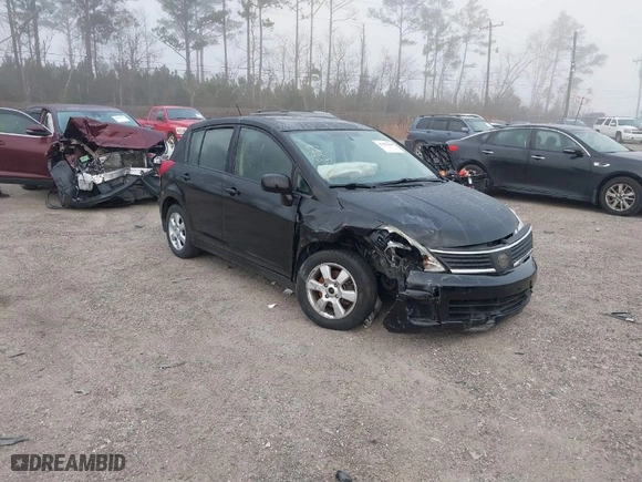 2009 Nissan Versa 1.8 S with VIN 3N1BC13E99L423269, listed as a IAAI auction lot 41490644 with 124,241 mi miles. Bid and sale history available at carsss.com. Image 1.