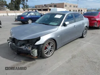 2005 BMW 5 Series 545i with VIN WBANB33555CN64724, listed as a IAAI auction lot 41715011 with 152,043 mi miles and . Bid and sale history available at carsss.com. Image 2.