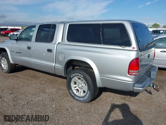 2001 Dodge Dakota Sport z VIN 1B7HG2AN91S290457, wystawiony jako IAAI lot #42381350 z przebiegiem 192 163 mil mil oraz . Historia ofert i sprzedaży dostępna na DreamBid. Obrazek 3.