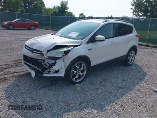 2015 Ford Escape Titanium with VIN 1FMCU0JXXFUA07175, listed as a IAAI auction lot 42447067 with 94,893 mi miles and . Bid and sale history available at DreamBid. Image 18.