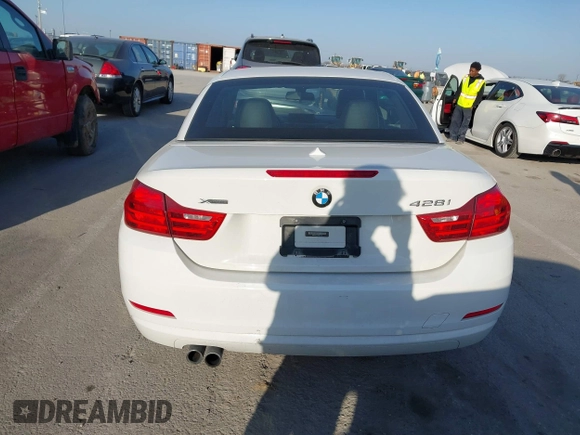 2015 BMW 4 Series 428i xDrive with VIN WBA3T1C51FP821140, listed as a IAAI auction lot 41802697 with 95,232 mi miles and . Bid and sale history available at carsss.com. Image 16.