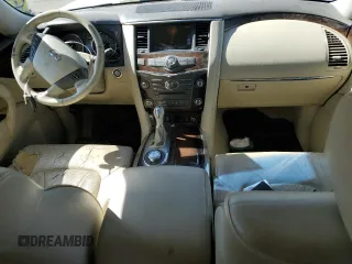 2012 Infiniti QX56 7-passenger with VIN JN8AZ2NE1C9017744, listed as a Copart auction lot 52988725 with 142,820 mi miles and Salvage title. Bid and sale history available at DreamBid. Image 8.