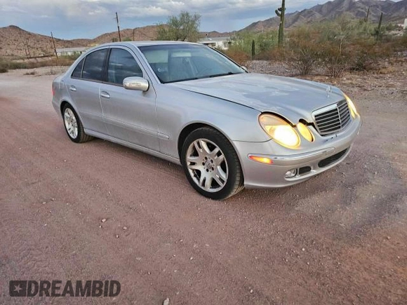 2003 Mercedes-Benz E-Class 5.0L with VIN WDBUF70J83A252853, listed as a Copart auction lot 77914304 with 181,702 mi miles and Clean Title. Bid and sale history available at carsss.com. Image 1.