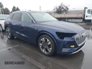 2022 Audi e-tron Premium Plus with VIN WA1LAAGE5NB022695, listed as a IAAI auction lot 41181338 with 14,711 mi miles and . Bid and sale history available at DreamBid. Image 1.