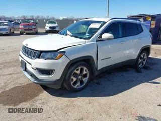 2021 Jeep Compass Limited with VIN 3C4NJCCBXMT573563, listed as a IAAI auction lot 41687325 with 75,768 mi miles and . Bid and sale history available at DreamBid. Image 2.