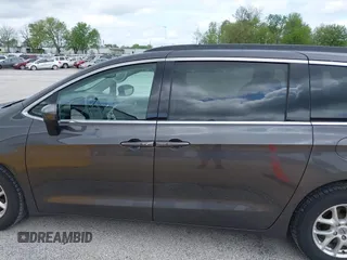 2021 Chrysler Voyager LXi with VIN 2C4RC1DG2MR542658, listed as a IAAI auction lot 42171818 with 62,123 mi miles and . Bid and sale history available at DreamBid. Image 14.