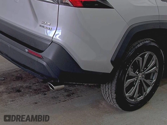 2022 Toyota RAV4 Hybrid XLE Premium with VIN 4T3B6RFV5NU085564, listed as a IAAI auction lot 42854215 with 49,616 mi miles and . Bid and sale history available at DreamBid. Image 2.