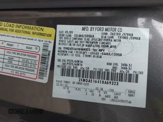 2005 Ford Freestar SE z VIN 2FMDA51645BA69323, wystawiony jako IAAI lot #40399931 z przebiegiem Nie podano mil oraz . Historia ofert i sprzedaży dostępna na DreamBid. Obrazek 9.