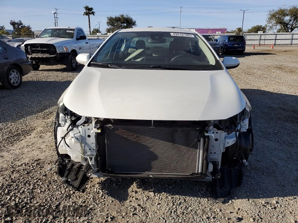 2021 Toyota Corolla Hybrid LE with VIN JTDEAMDE2MJ021576, listed as a Copart auction lot 49916105 with 24,292 mi miles and Salvage Title. Bid and sale history available at carsss.com. Image 5.