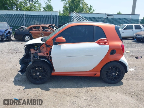 2016 Smart fortwo Passion with VIN WMEFJ5DA7GK079058, listed as a IAAI auction lot 42415044 with 42,279 mi miles and . Bid and sale history available at DreamBid. Image 14.