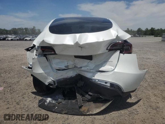 2022 Tesla Model Y Long Range z VIN 7SAYGDEE9NF455614, wystawiony jako Copart lot #57612985 z przebiegiem 22 101 mil mil oraz Szkoda całkowita • Salvage title. Historia ofert i sprzedaży dostępna na DreamBid. Obrazek 6.