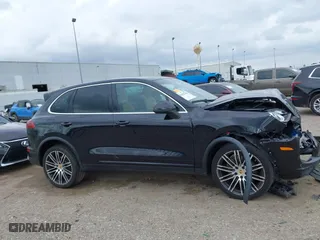 2017 Porsche Cayenne with VIN WP1AA2A2XHKA90706, listed as a IAAI auction lot 41692768 with 92,800 mi miles. Bid and sale history available at carsss.com. Image 14.
