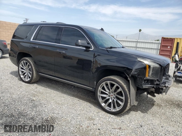 2015 GMC Yukon Denali z VIN 1GKS2CKJ9FR609462, wystawiony jako Copart lot #56685575 z przebiegiem 125 679 mil mil oraz Szkoda całkowita • Salvage title. Historia ofert i sprzedaży dostępna na DreamBid. Obrazek 4.