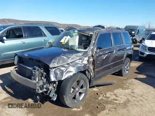 2015 Jeep Patriot High Altitude with VIN 1C4NJRFB9FD376651, listed as a IAAI auction lot 41416297 with 121,690 mi miles and . Bid and sale history available at carsss.com. Image 2.