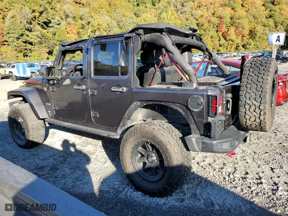 2018 Jeep Wrangler JK Unlimited Rubicon Recon with VIN 1C4HJWFG5JL803636, listed as a Copart auction lot 76370924 with 77,943 mi miles and Salvage Title. Bid and sale history available at carsss.com. Image 2.
