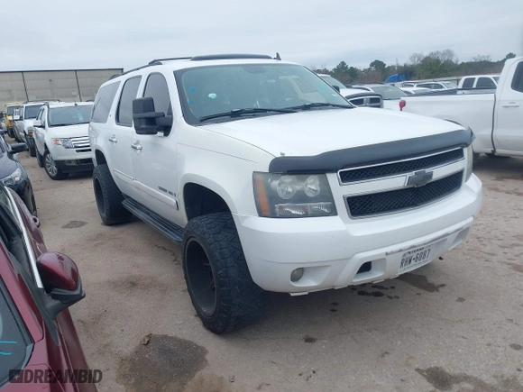 2008 Chevrolet Suburban LT w/3LT with VIN 3GNFC16048G187823, listed as a IAAI auction lot 41612832 with 244,128 mi miles. Bid and sale history available at carsss.com. Image 1.
