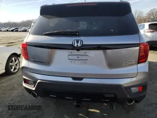 2022 Honda Passport Elite z VIN 5FNYF8H05NB029121, wystawiony jako Copart lot #84228064 z przebiegiem 25 154 mil mil oraz Szkoda całkowita • Salvage title. Historia ofert i sprzedaży dostępna na DreamBid. Obrazek 6.
