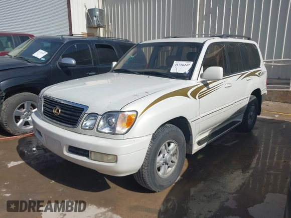 2000 Lexus LX 470 with VIN JT6HT00W5Y0080249, listed as a IAAI auction lot 41726247 with 315,707 mi miles and . Bid and sale history available at carsss.com. Image 2.