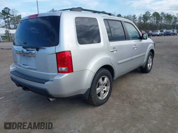 2009 Honda Pilot EX-L with VIN 5FNYF48559B034121, listed as a IAAI auction lot 41928138 with 193,969 mi miles. Bid and sale history available at carsss.com. Image 4.