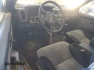 1989 Nissan Hardbody z VIN 1N6HD16S3KC401756, wystawiony jako Copart lot #46811635 z przebiegiem 78 698 mil mil oraz Szkody całkowita. Historia ofert i sprzedaży dostępna na DreamBid. Obrazek 8.