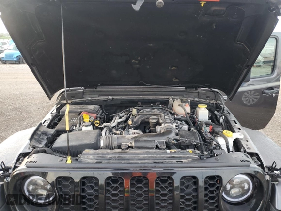 2021 Jeep Gladiator 80th Anniversary with VIN 1C6HJTAG7ML619025, listed as a Copart auction lot 63309365 with 69,126 mi miles and Salvage title. Bid and sale history available at DreamBid. Image 11.