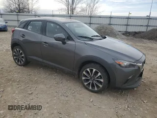 2019 Mazda CX-3 Touring with VIN JM1DKFC7XK0425624, listed as a Copart auction lot 48925815 with 63,563 mi miles and Non Repairable. Bid and sale history available at DreamBid. Image 4.
