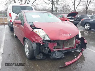 2005 Toyota Prius z VIN JTDKB20U257055663, wystawiony jako IAAI lot #41580381 z przebiegiem 123 032 mil mil oraz . Historia ofert i sprzedaży dostępna na DreamBid. Obrazek 6.