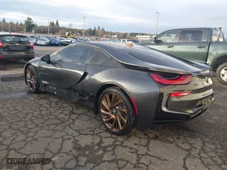 2016 BMW i8 with VIN WBY2Z2C50GV674856, listed as a IAAI auction lot 40862121 with 51,700 mi miles. Bid and sale history available at carsss.com. Image 3.