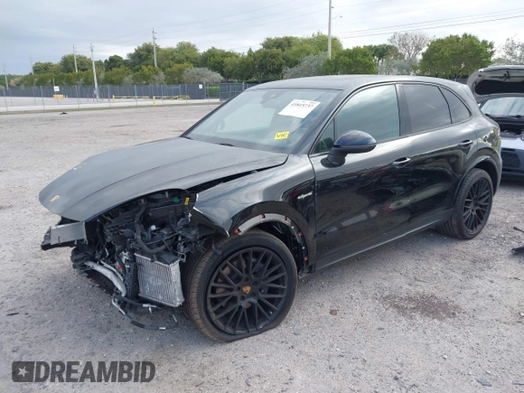 2021 Porsche Cayenne E-Hybrid Hybrid z VIN WP1AE2AYXMDA24566, wystawiony jako IAAI lot #41815737 z przebiegiem 51 149 mil mil oraz . Historia ofert i sprzedaży dostępna na DreamBid. Obrazek 18.
