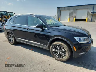 2018 Volkswagen Tiguan SEL with VIN 3VV2B7AX5JM015388, listed as a Copart auction lot 60222195 with 121,389 mi miles and Salvage title. Bid and sale history available at DreamBid. Image 4.