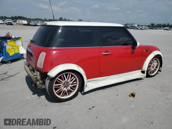 2004 MINI Hardtop with VIN WMWRC33444TC50103, listed as a Copart auction lot 63449615 with 144,467 mi miles and Salvage title. Bid and sale history available at DreamBid. Image 3.