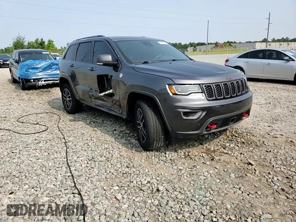 2017 Jeep Grand Cherokee Trailhawk with VIN 1C4RJFLT3HC614449, listed as a Copart auction lot 58559335 with 153,051 mi miles and Salvage title. Bid and sale history available at DreamBid. Image 15.