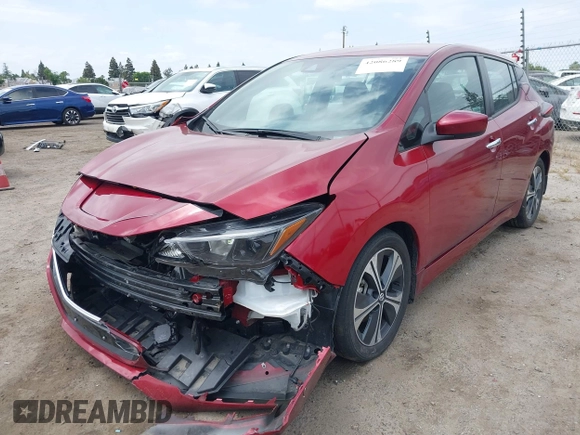 2022 Nissan LEAF SV with VIN 1N4AZ1CV8NC563090, listed as a IAAI auction lot 42086289 with 24,215 mi miles and . Bid and sale history available at DreamBid. Image 2.
