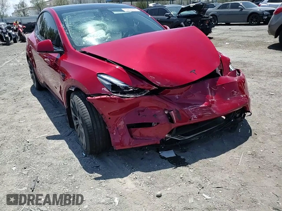 2022 Tesla Model Y Performance z VIN 7SAYGDEF9NF510183, wystawiony jako Copart lot #61263405 z przebiegiem 19 411 mil mil oraz Szkoda całkowita • Salvage title. Historia ofert i sprzedaży dostępna na DreamBid. Obrazek 14.