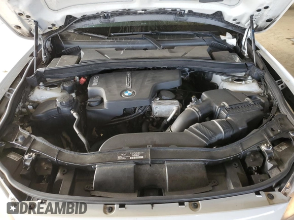 2015 BMW X1 sDrive28i with VIN WBAVM1C50FVW58031, listed as a Copart auction lot 48552735 with 205,392 mi miles and Salvage Title. Bid and sale history available at carsss.com. Image 12.