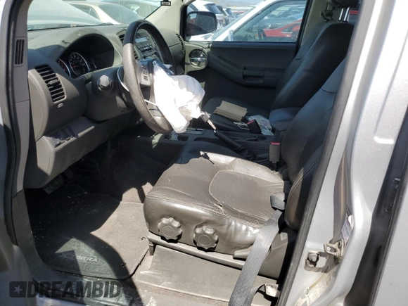 2010 Nissan Xterra S with VIN 5N1AN0NU2AC519838, listed as a Copart auction lot 57301355 with 129,990 mi miles and Salvage title. Bid and sale history available at DreamBid. Image 7.