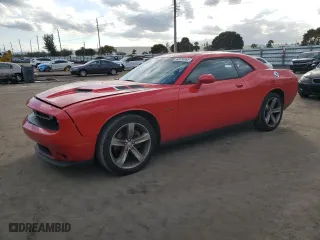 2015 Dodge Challenger R/T with VIN 2C3CDZAT4FH737497, listed as a Copart auction lot 42620365 with 67,579 mi miles and Salvage Title. Bid and sale history available at carsss.com. Image 1.