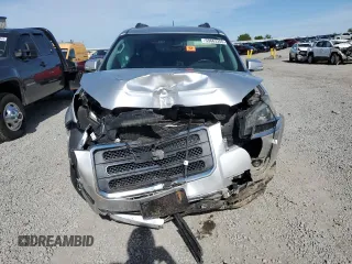 2014 GMC Acadia SLT z VIN 1GKKRRKD5EJ115511, wystawiony jako Copart lot #53663355 z przebiegiem 167 457 mil mil oraz Szkoda całkowita • Salvage title. Historia ofert i sprzedaży dostępna na DreamBid. Obrazek 5.