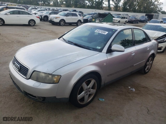 2002 Audi A4 1.8T with VIN WAULC68E52A234717, listed as a Copart auction lot 64574594 with 180,284 mi miles and Salvage Title. Bid and sale history available at carsss.com. Image 1.