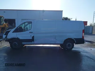 2021 Ford Transit Cargo with VIN 1FTBR1Y82MKA53386, listed as a IAAI auction lot 42058972 with 98,677 mi miles. Bid and sale history available at carsss.com. Image 15.