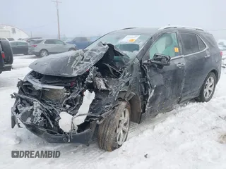 2021 Chevrolet Equinox Premier z VIN 3GNAXXEV2MS137119, wystawiony jako IAAI lot #41344057 z przebiegiem Nie podano mil oraz . Historia ofert i sprzedaży dostępna na DreamBid. Obrazek 17.
