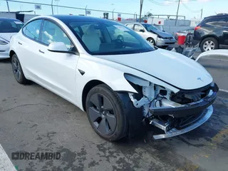 2023 Tesla Model 3 with VIN 5YJ3E1EA6PF495631, listed as a IAAI auction lot 41568118 with 10,073 mi miles and . Bid and sale history available at DreamBid. Image 1.