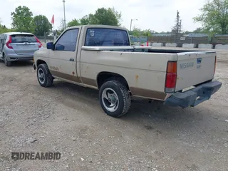 1986 Nissan Hardbody E with VIN JN6ND11S0GW000696, listed as a IAAI auction lot 42358321 with 445,199 mi miles and . Bid and sale history available at DreamBid. Image 3.
